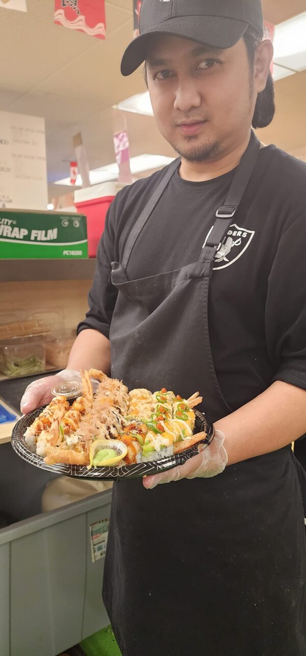 click n roll allen serving sushi