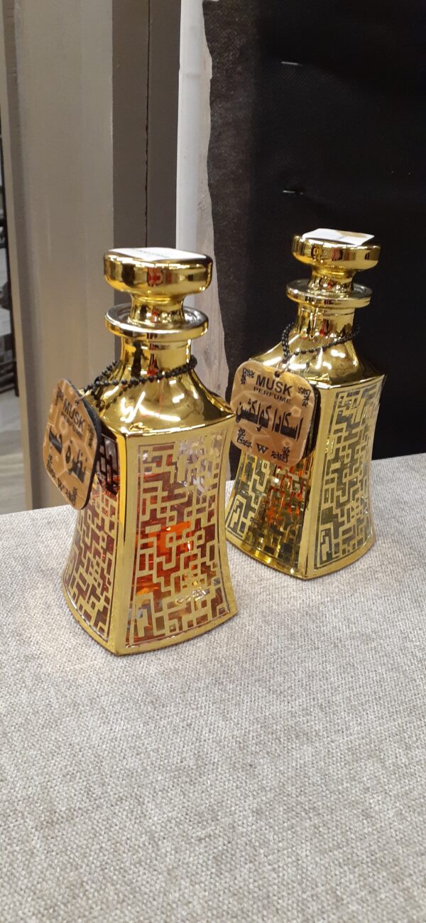 musk perfume gold decanters